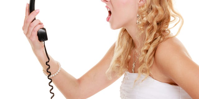 A bride accused her parents of trying to ruin her wedding because her father had to have dental surgery two weeks before and wouldn't be able to watch her young children during the ceremony, according to a Reddit post. (iStock)