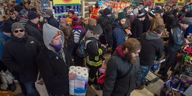 Customers fill a Sobeys grocery store in St. John's, Newfoundland, Tuesday, Jan. 21, 2020.
