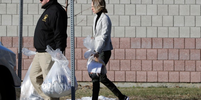 Michelle Carter leaves the Bristol County jail, Thursday, Jan. 23, 2020, in Dartmouth, Mass., after serving most of a 15-month manslaughter sentence for urging her suicidal boyfriend to kill himself in 2014. (AP Photo/Steven Senne)