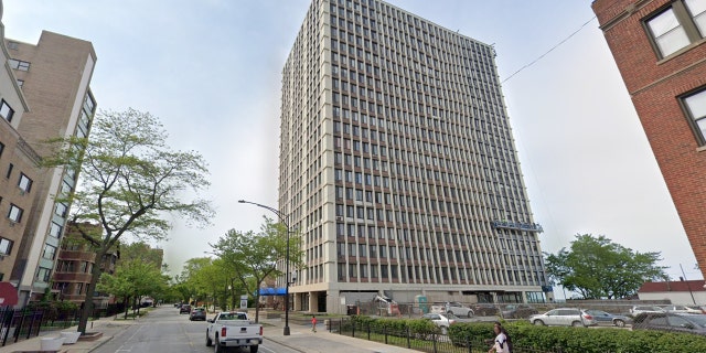 An unidentified woman in her thirties jumped out an 11th-floor window of this building in the 7200 block of South Shore Drive at around 1:50 a.m with her 1-year-old son, police said.