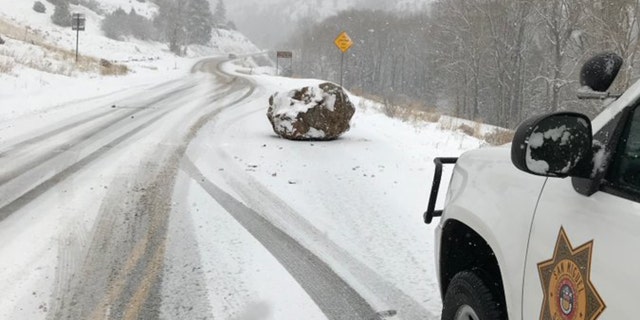 The "large boulder the size of a small boulder" fell on Colorado State Highway 145 outside Telluride on Monday afternoon.