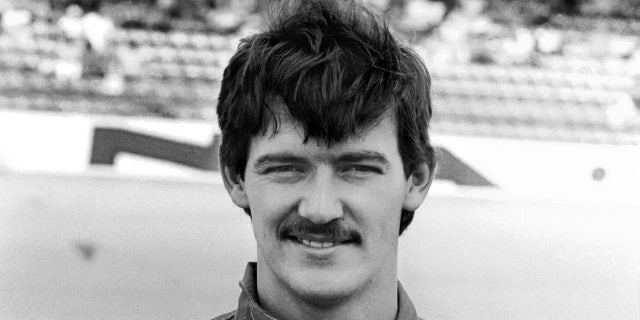 NASCAR driver Davey Allison poses for photographers prior to the 1985 Daytona 500 at the Daytona International Speedway on February 16, 1985 in Daytona Beach, Florida. (Photo by Robert Alexander/Archive Photos/Getty Images)