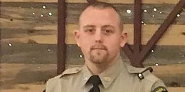 Deputy Chris Dickerson, 28, died in a hospital after being struck multiple times by gunfire, authorities say. (East Texas Council of Government)