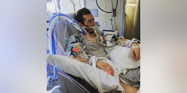 Nick Sommons in hospital after he got blood clots in his brain from a severe, secondary infection associated with an ear infection.