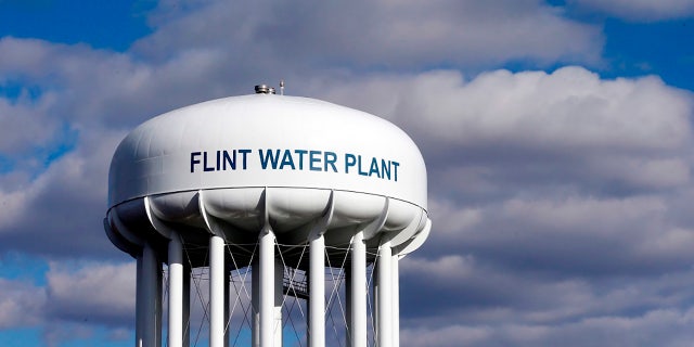 March 21, 2016: Flint Water Plant water tower is seen in Flint, Mich. (AP Photo/Carlos Osorio, File)
