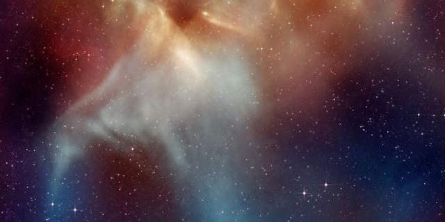 The red star Betelgeuse is seen above.