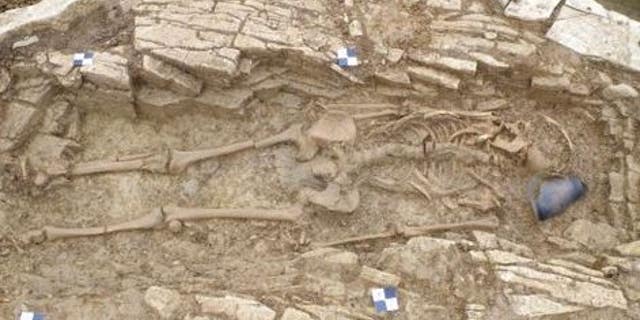 The remains of a woman believed to have been buried with a pillow behind her head were among those found.