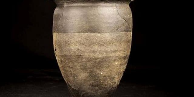 Reconstructed ceramic pot which was placed in the grave as an offering