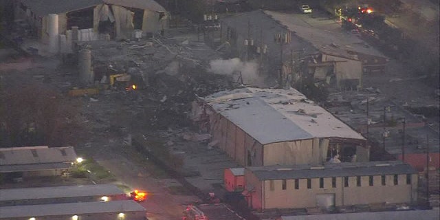 Image shows Watson Grinding Manufacturing in Houston after an explosion shortly after 4 a.m. local time Friday.