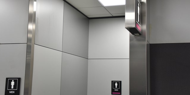 The drunken passenger went to the bathroom and locked himself in a stall where he continued to drink and smoke. He later asked police to just “take him to jail.”