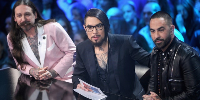 Host Dave Navarro flanked by judges Oliver Peck (L) and Chris Nunez (R) onstage during