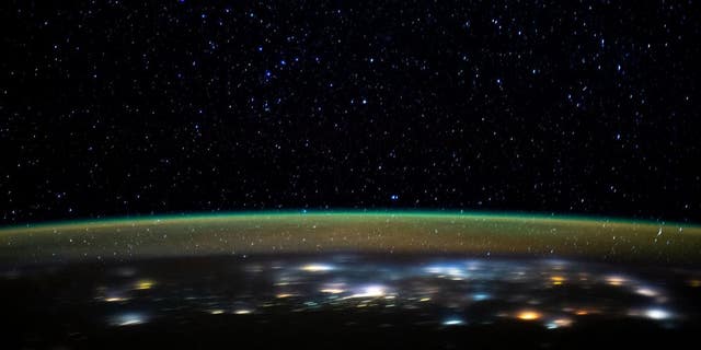 The sparkling lights of Earth are seen in this image released by NASA.