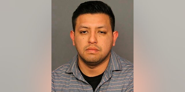 Leon-Alvarez was suspended without pay from the police department during the investigation of sexual assault reported early Friday, according to a statement by Denver police officials. (Denver Police Department via AP)