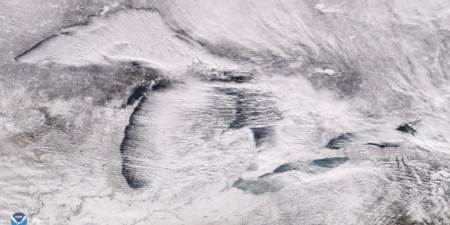 Parallel rows of clouds, known as "cloud streets" can be seen streaming over the Great Lakes on Christmas Day 2017 when up to 60 inches of snow fell on parts of Pennsylvania.