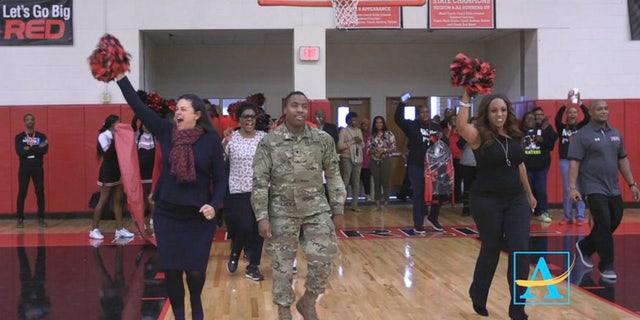 U.S. Army Spc. Shakir Aquil recently surprised his mom at the school where she works in Atlanta.