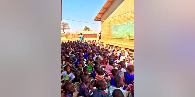 Children at the Chipala Primary School in Lilongwe, Malawi, frequently would learn lessons outdoors, seated shoulder-to-shoulder on loose, red dirt.
