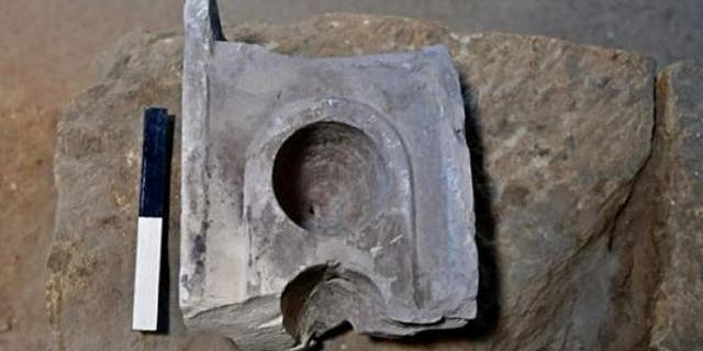 The top part of the measuring table found at the excavation site of the ‘ancient Jerusalem market’.