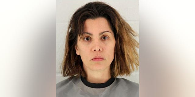 Mollie Fitzgerald, 38, was arrested on charges of second-degree murder in connection with the stabbing death of her mother, authorities say. (Johnson County Detention Center)