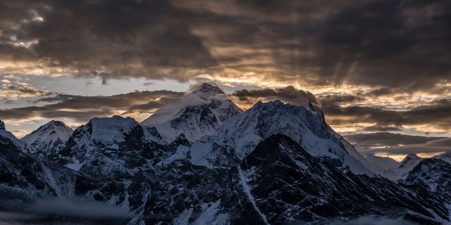 Summits of Mt. Everest and Mt. Makalu, seen from summit of Gokyo Ri, before sunrise in September 2019. (Photo by Frank Bienewald/LightRocket via Getty Images)
