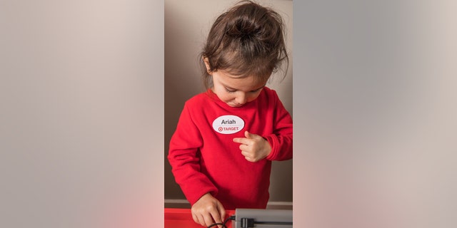 Not one detail was spared, even down to the Target nametag that Ariah has pinned on her shirt.