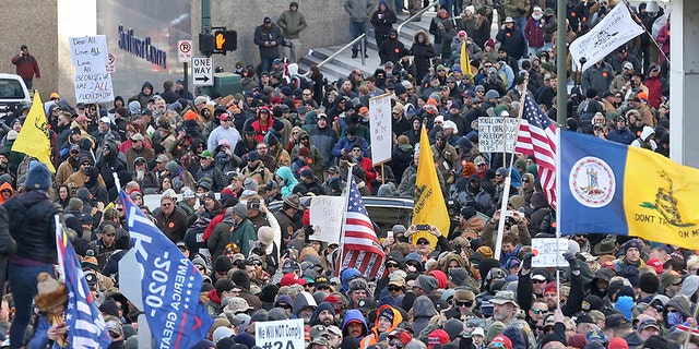 Second Amendment supporters gather on Bank Street outside the Virginia state capitol on Monday. (AP/The Virginian-Pilot)