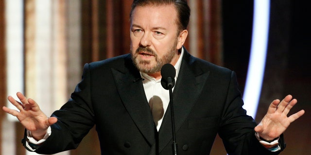 This image released by NBC shows host Ricky Gervais speaking at the 77th Annual Golden Globe Awards at the Beverly Hilton Hotel in Beverly Hills, Calif., on Sunday, Jan. 5, 2020. (Paul Drinkwater/NBC via AP)