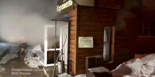 A view of a damaged hotel of nine rooms located in the basement of a residential building which was flooded with boiling water after a pipe ruptured in Perm, Russia on Monday.