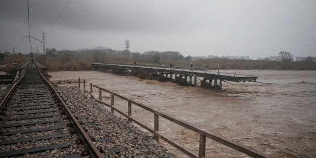 View of a collapsed train track and a bridge due a heavy storm in Malgrat, near Barcelona, Spain, Wednesday, Jan. 22, 2020.