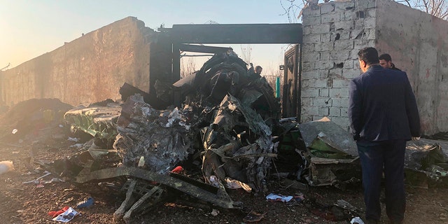 Debris is seen from a plane crash on the outskirts of Tehran, Iran, Wednesday, Jan. 8, 2019. (AP Photos/Mohammad Nasiri)