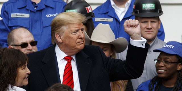 Then-President Trump pumps his fist aft signing a caller North American waste and acquisition statement pinch Canada and Mexico. Wednesday, Jan. 29, 2020, successful Washington.