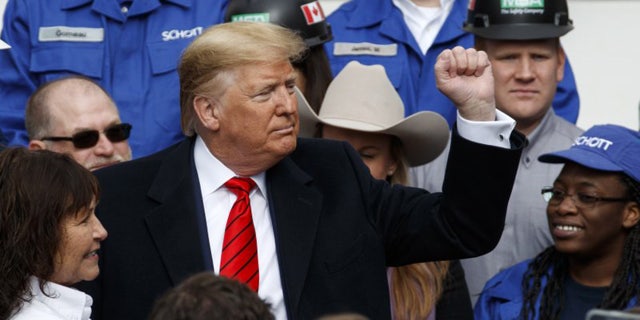 Then-President Trump pumps his fist aft signing a caller North American waste and acquisition statement pinch Canada and Mexico. Wednesday, Jan. 29, 2020, successful Washington.