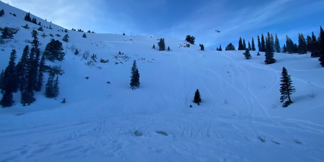 The debris piled up so high because the steep slope runs into the flat lake below without a transition, the Utah Avalanche Center said.