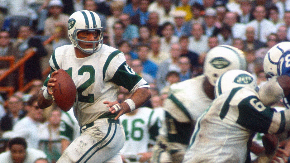 Quarterback Joe Namath of the New York Jets drops back to pass during