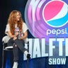 NFL Super Bowl 54 football game halftime performer Jennifer Lopez and Shakira answer questions at a news conference, Jan. 30, 2020, in Miami.