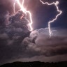 Lightning strikes as ash spew from the crater of the Taal Volcano during an eruption seen from Tagaytay City, Philippines, January 12, 2020. 