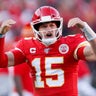 Kansas City Chiefs' Patrick Mahomes celebrates after throwing a touchdown pass during the first half of the AFC Championship football game against the Tennessee Titans in Kansas City, Jan. 19, 2020.