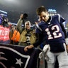 New England Patriots quarterback Tom Brady leaves the field after losing an NFL wild-card playoff football game to the Tennessee Titans, in Foxborough, Jan. 4, 2020.
