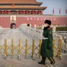 Paramilitary police wear face masks as they stand guard at Tiananmen Gate adjacent to Tiananmen Square in Beijing, Jan. 27, 2020. 