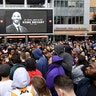 People gather outside Staples Center in Los Angeles, after the death of Laker legend Kobe Bryant.