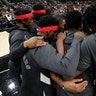 Toronto Raptors players huddle together following a moment of silence for Kobe Bryant.