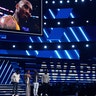 Nathan Morris, from left, Wanya Morris, Shawn Stockman, of Boyz II Men‎, and Alicia Keys, second left, sing a tribute in honor of the late Kobe Bryant, seen on screen, at the 62nd annual Grammy Awards in Los Angeles. 