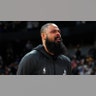 Houston Rockets center Tyson Chandler cries during a tribute to Kobe Bryant. 