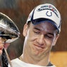 Feb. 4, 2007, Miami: Quarterback Peyton Manning holds the Vince Lombardi trophy after his team won Super Bowl XLI against the Chicago Bears at Dolphin Stadium. Manning completed 25 of 38 passes for 247 yards and one touchdown to lead Indianapolis to a 29-17 win over the Chicago Bears as the Colts claimed their first Super Bowl title in 36 years.