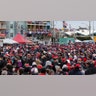A crowd stands in the cold in front of the Wildwoods Convention Center.