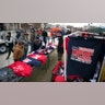 People walking past vendors selling Trump merchandise near the Wildwoods Convention Center before the campaign rally.