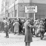 An auxiliary Jewish police force keeps order in the Lodz Ghetto, which was used by the Germans to organize the selection of people for deportation.