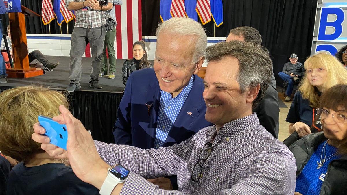 Former Vice President Joe Biden takes selfies with supporters at a post-Nevada caucus celebration, in North Las Vegas, Nevada on Feb. 22. 2020