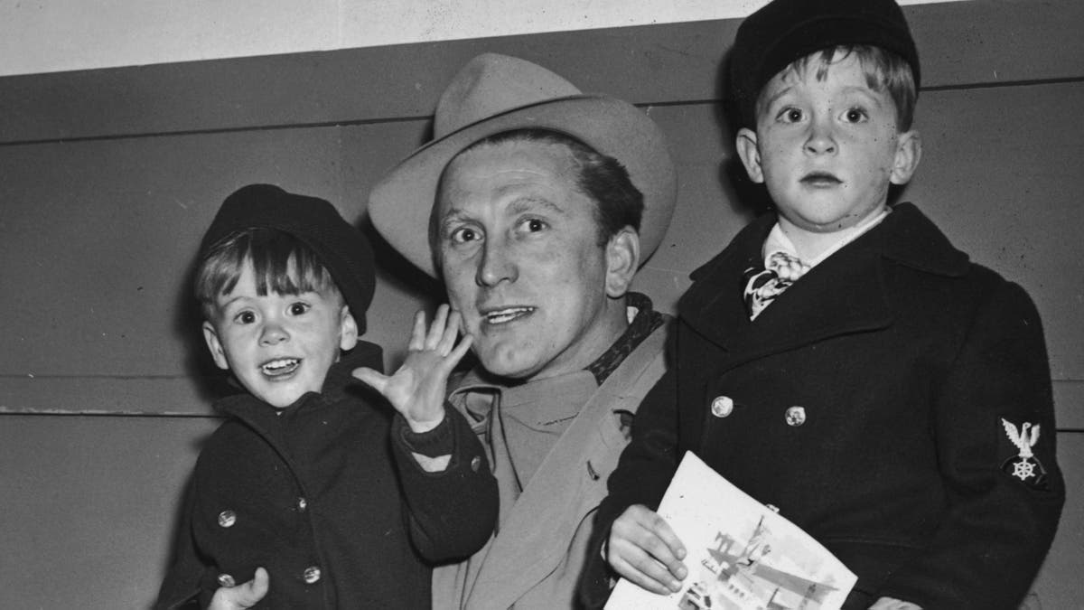Kirk Douglas with sons Joel (left) and Michael (right). (Photo by Hulton Archive/Getty Images)