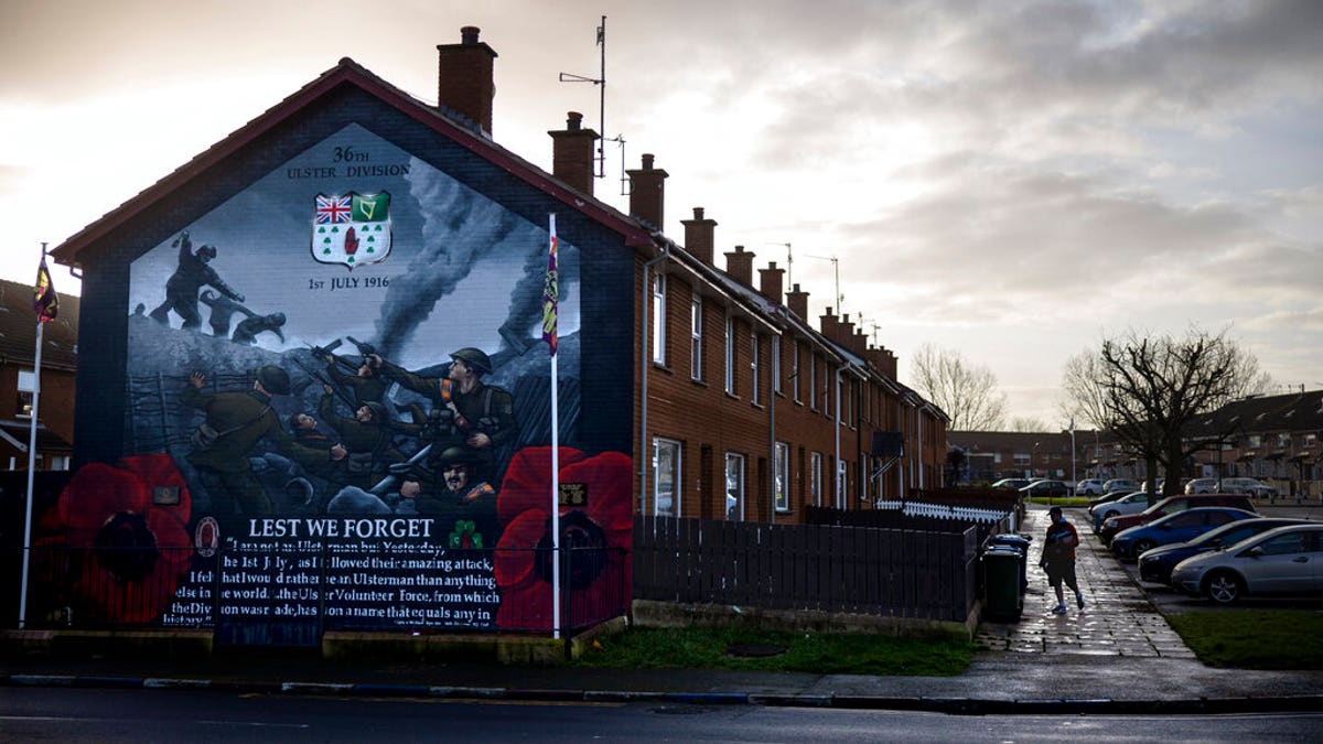 A mural commemorating a Protestant infantry division fighting in World War I's Battle of the Somme, in which both Catholics and Protestants fought a common enemy, decorates the side of a housing complex, Thursday, Dec. 19, 2019, in Portadown, Northern Ireland.?