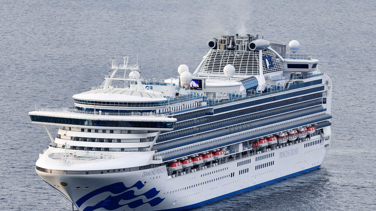 The cruise ship Diamond Princess anchors off the Yokohama Port upon arrival in Yokohama, near Tokyo Tuesday, Feb. 4, 2020. (Kyodo News via AP)